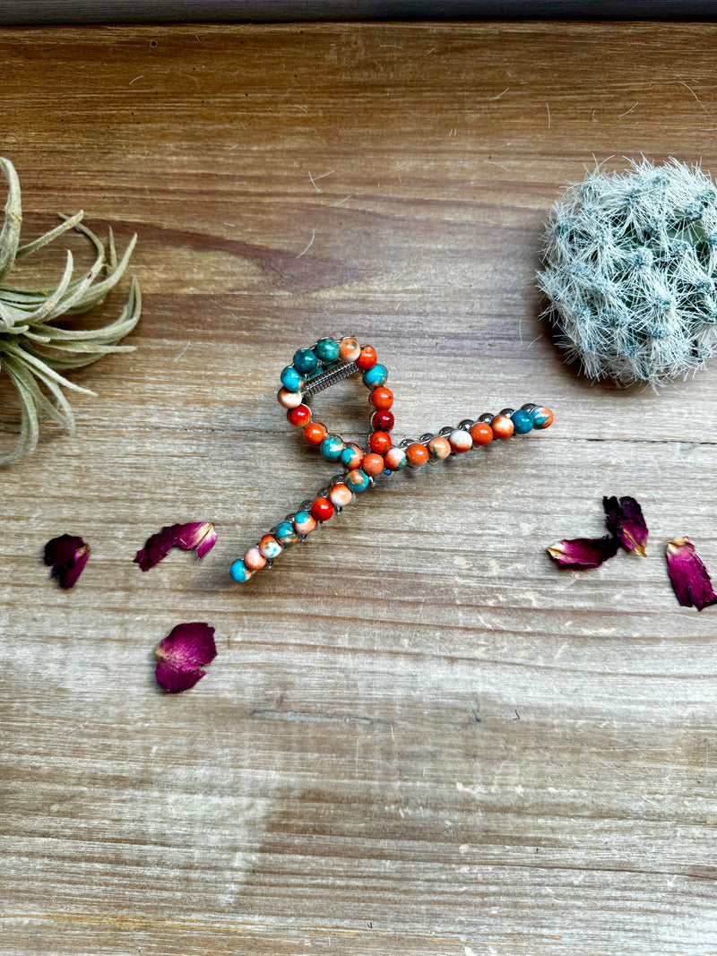 Orange and turquoise magnesite bead hair clips