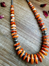 22 Inch orange spiny, hematite and sterling silver pearls